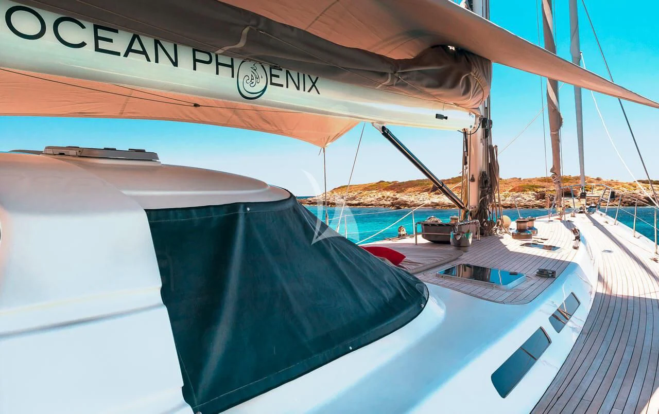 a boat on the water aboard OCEAN PHOENIX Yacht for Sale