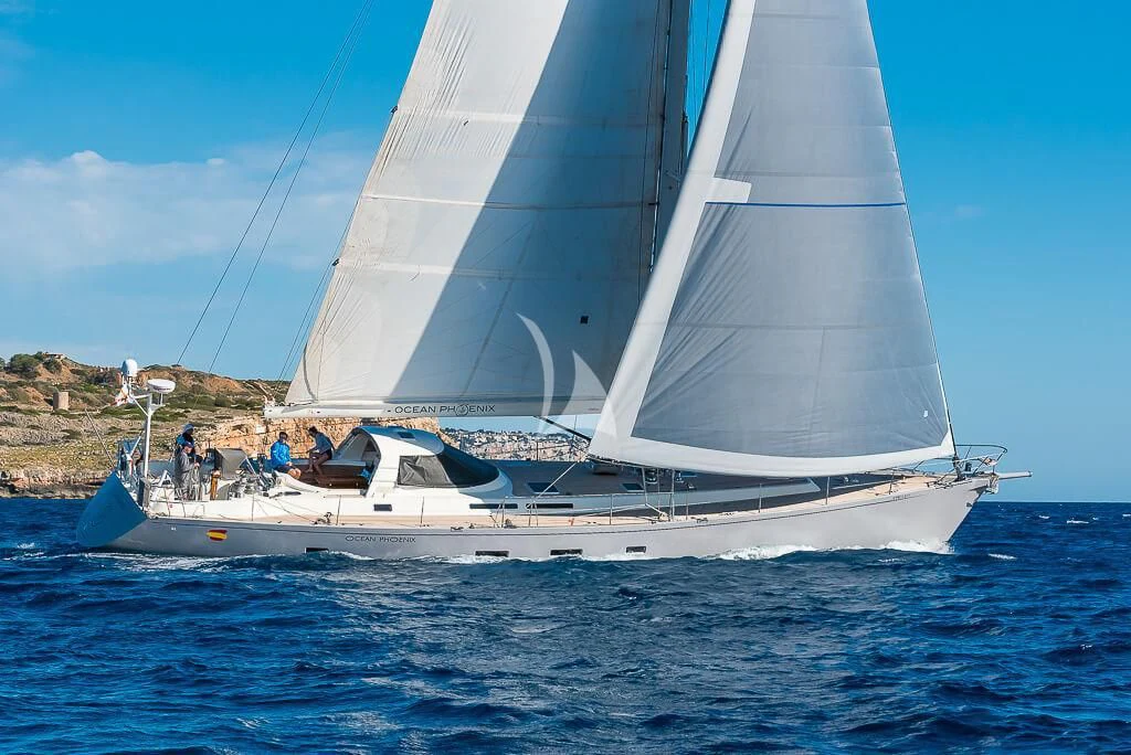 a sailboat on the water aboard OCEAN PHOENIX Yacht for Sale