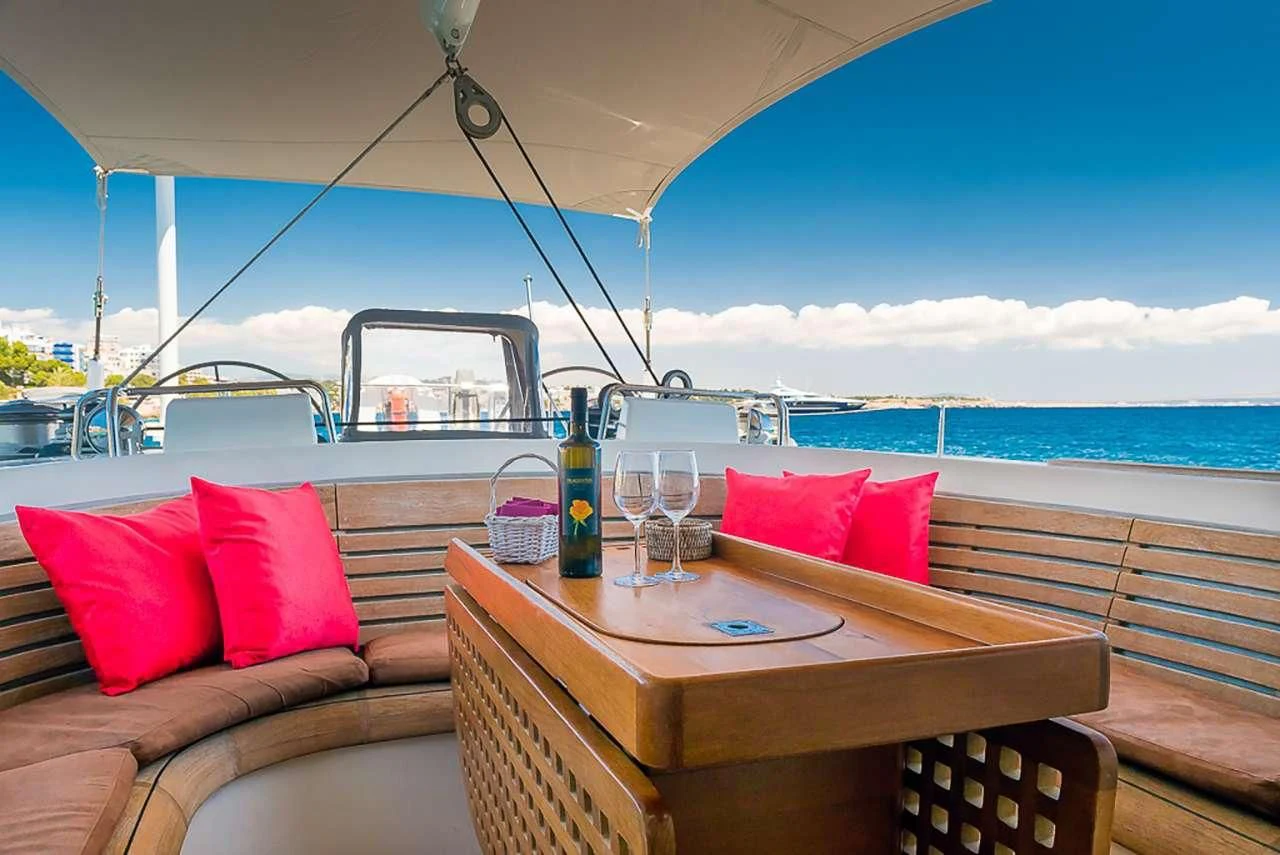 a table on a boat aboard OCEAN PHOENIX Yacht for Sale