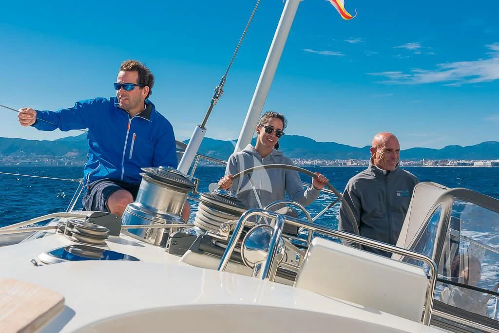 a group of men on a boat aboard OCEAN PHOENIX Yacht for Sale