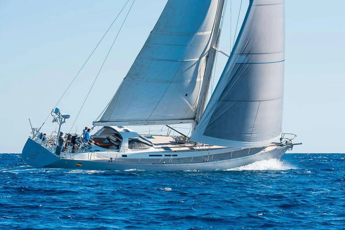 a sailboat on the water aboard OCEAN PHOENIX Yacht for Sale