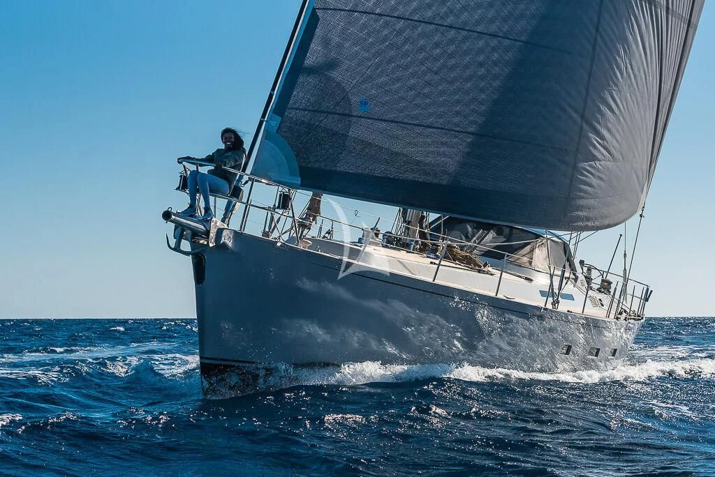 a man sailing on a boat aboard OCEAN PHOENIX Yacht for Sale