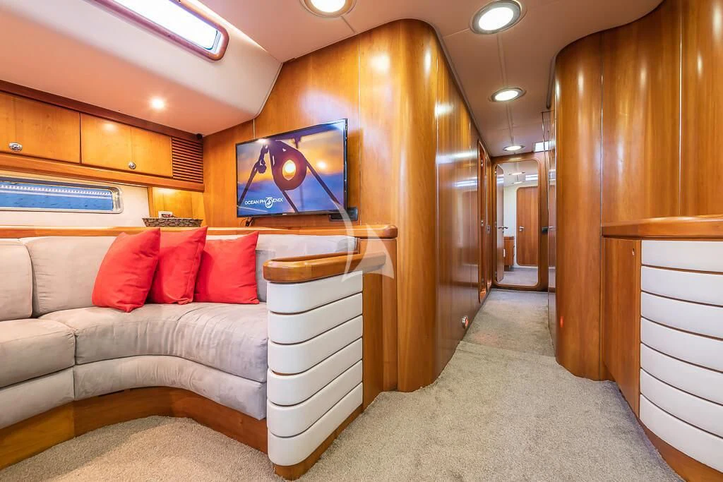 a bed in a room aboard OCEAN PHOENIX Yacht for Sale