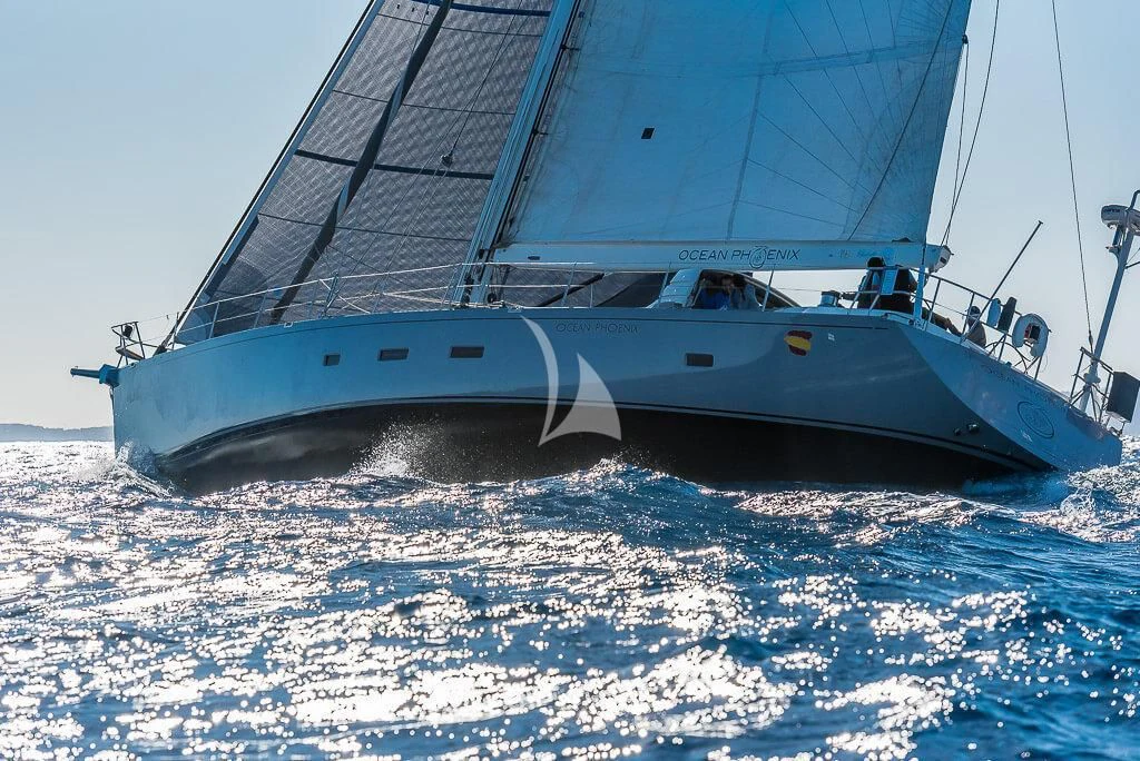 a boat on the water aboard OCEAN PHOENIX Yacht for Sale