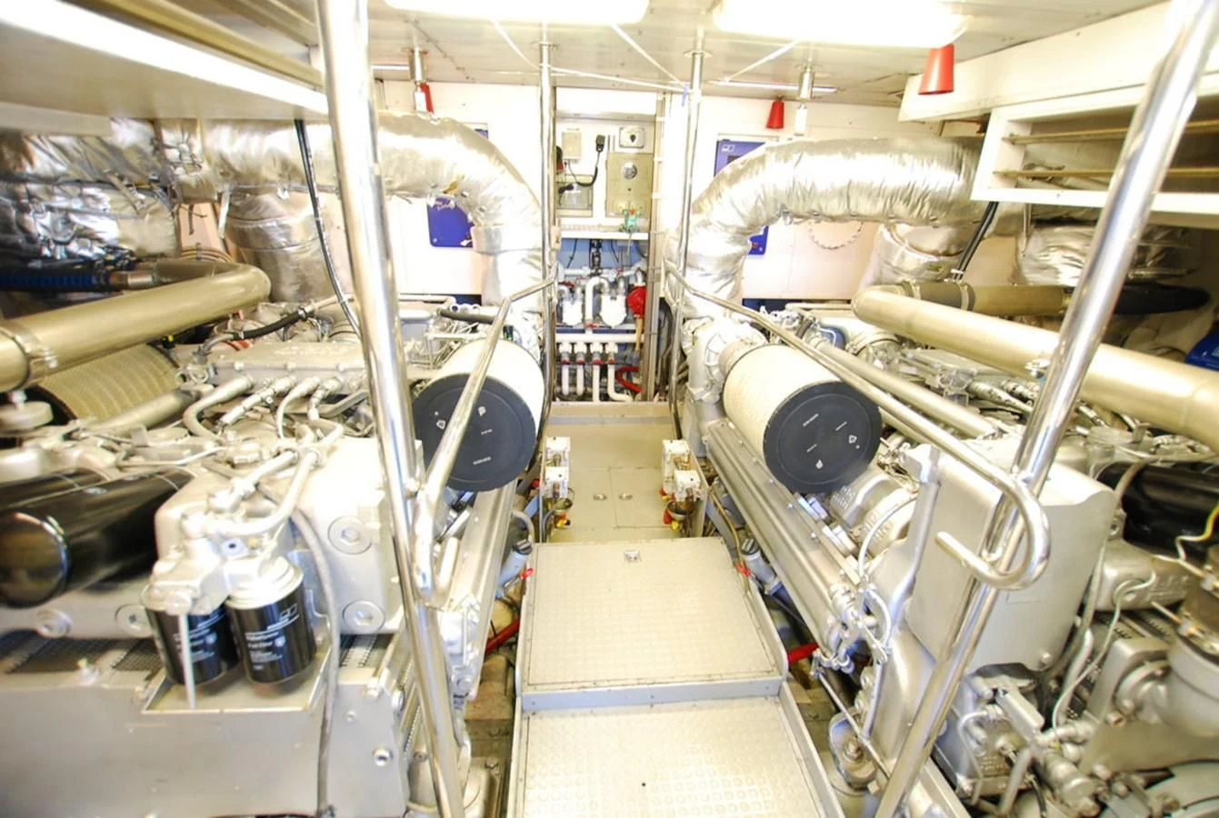 a room with machines and pipes aboard COOKIE Yacht for Charter