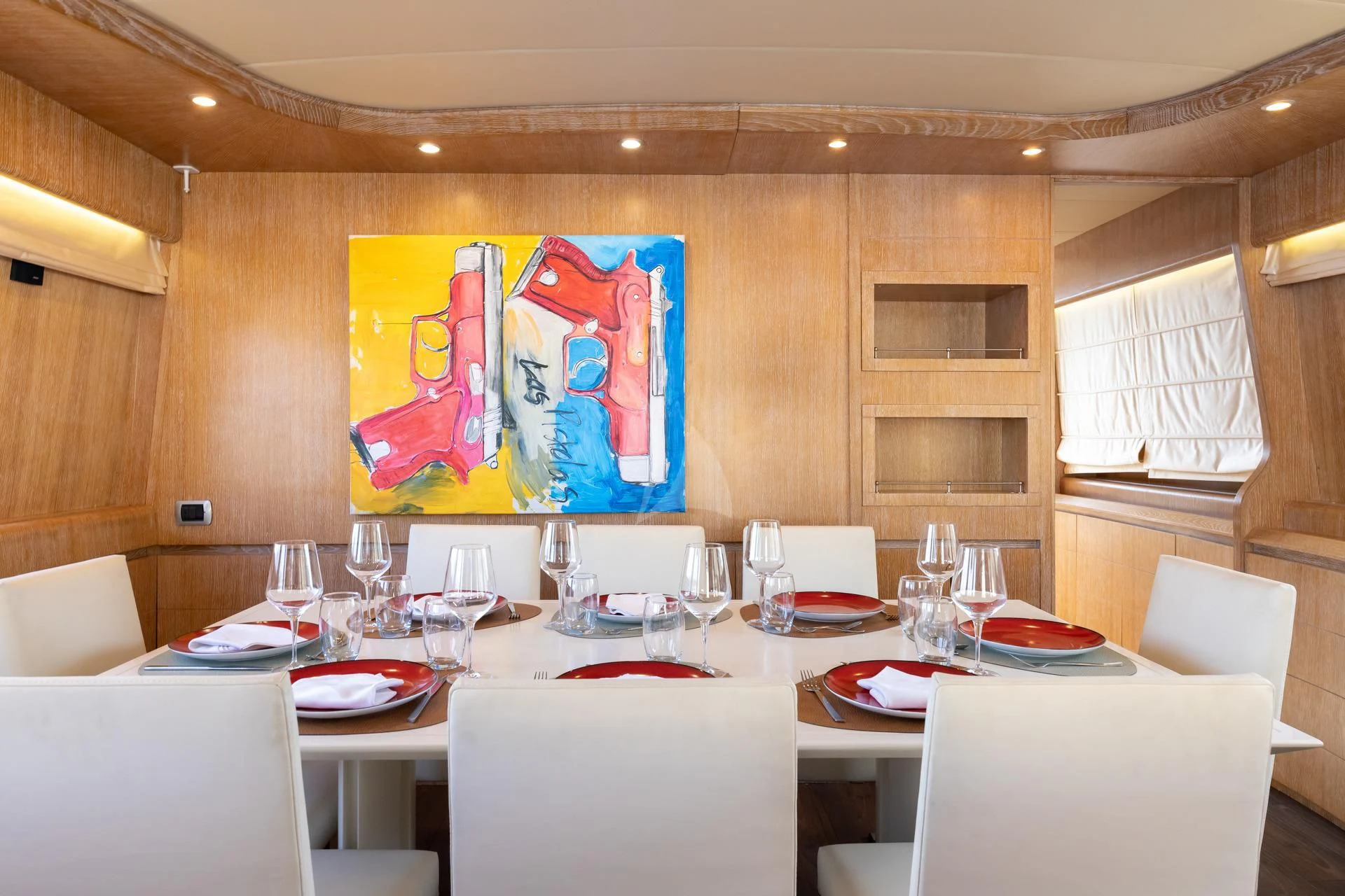 a restaurant with tables and chairs aboard COOKIE Yacht for Charter