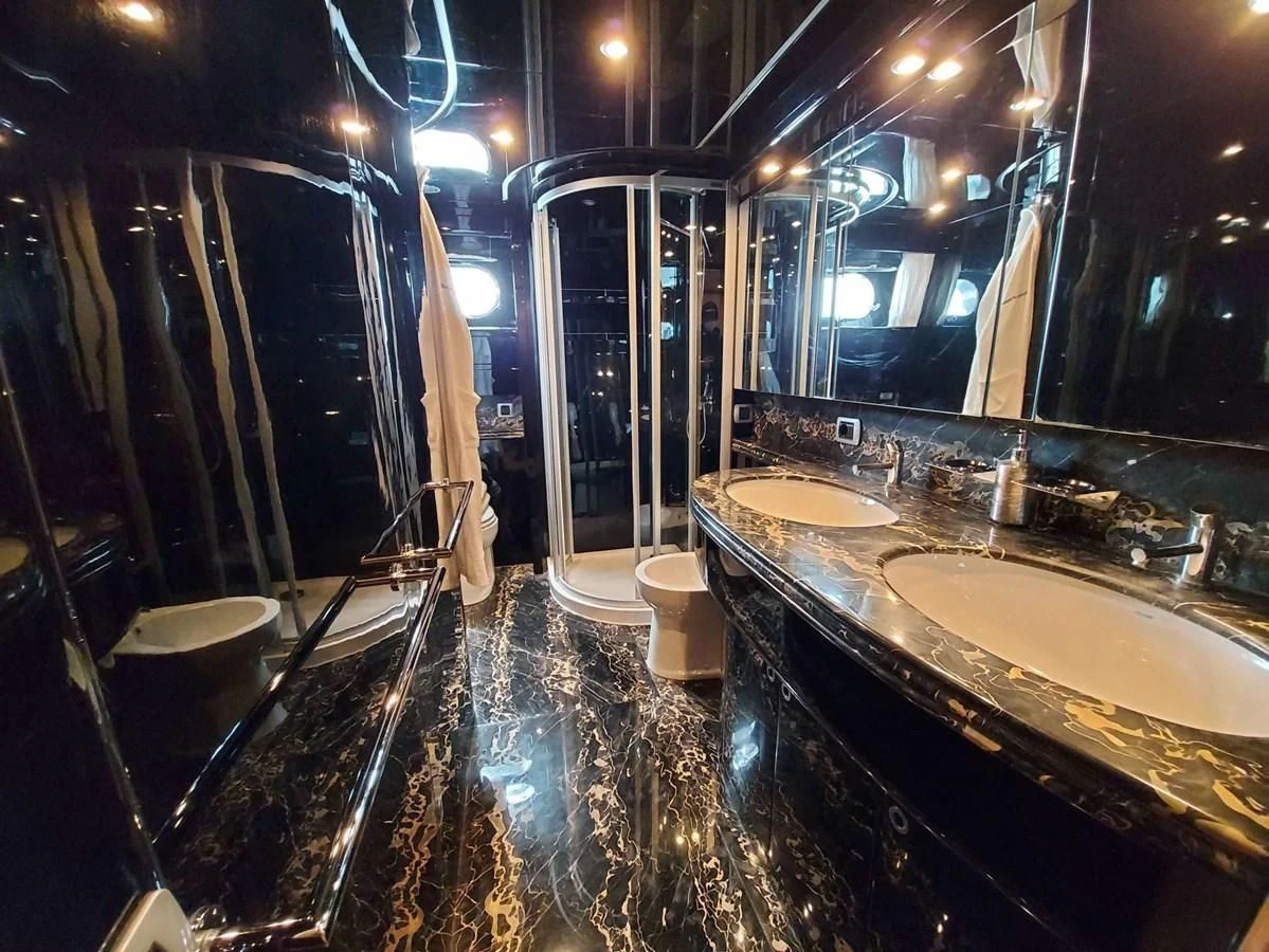 a bathroom with sinks and mirrors aboard COOKIE Yacht for Charter