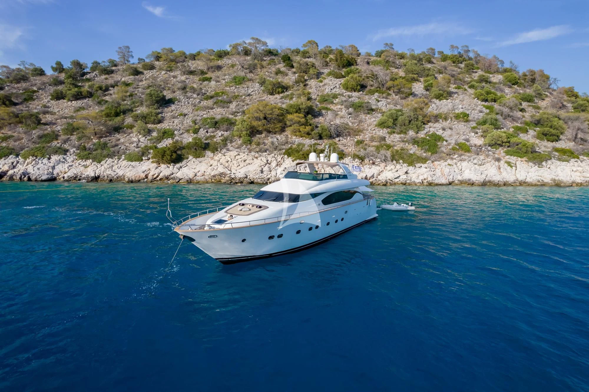 a white boat in the water aboard COOKIE Yacht for Charter