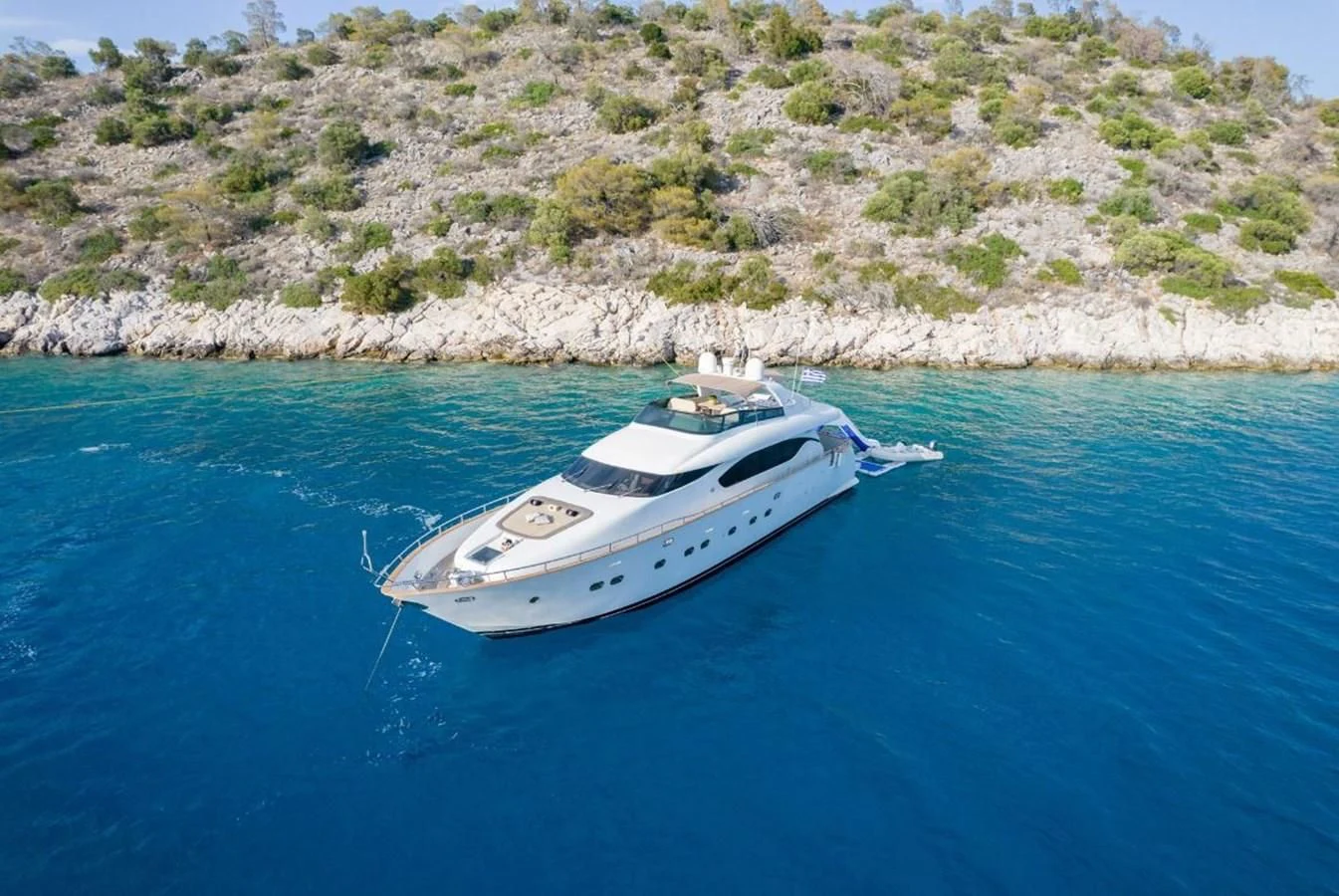 a white boat in the water aboard COOKIE Yacht for Charter