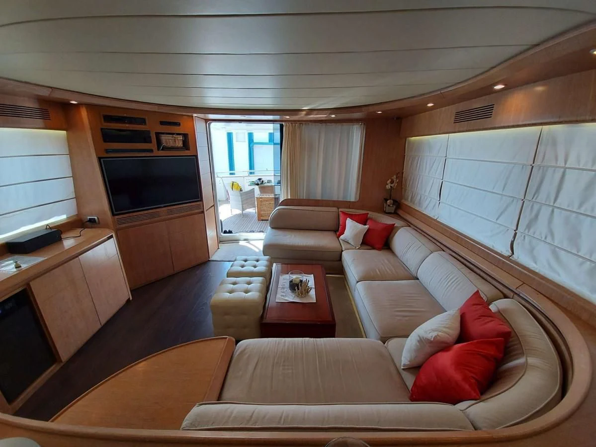 a living room with a couch and a table aboard COOKIE Yacht for Charter