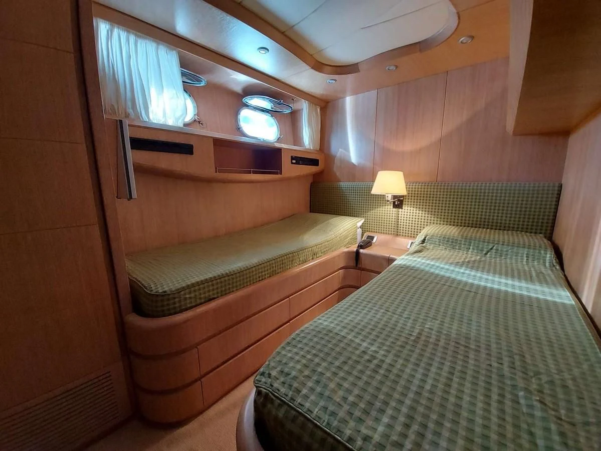 a room with two beds aboard COOKIE Yacht for Charter