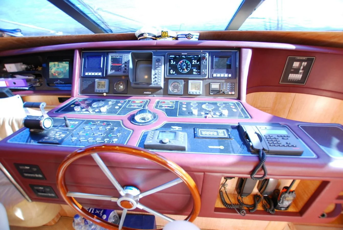 a red and purple paneled computer aboard COOKIE Yacht for Charter