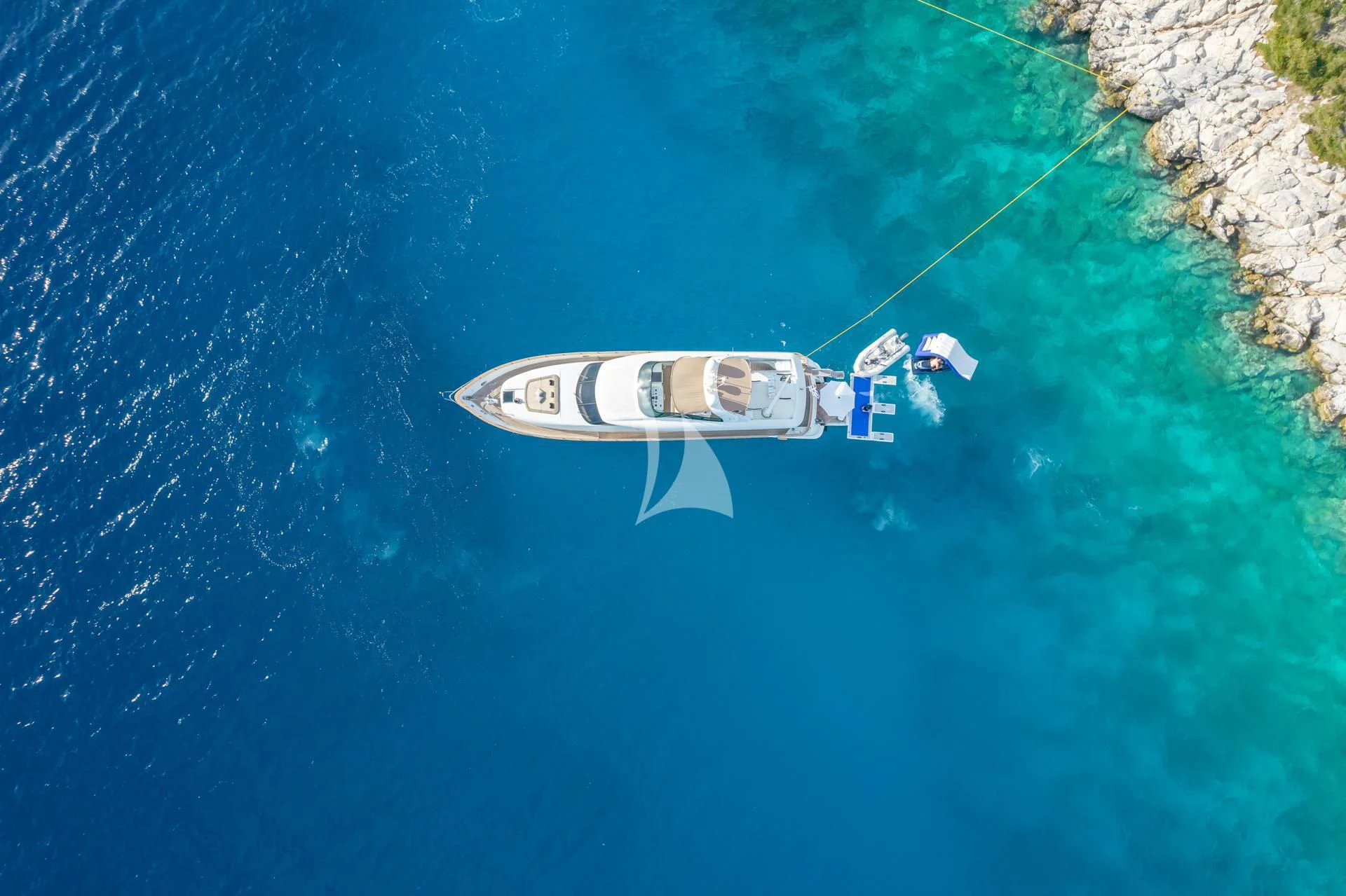 a white boat in the water aboard COOKIE Yacht for Charter