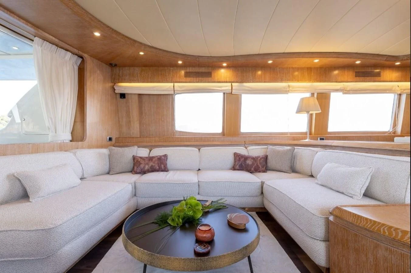 a living room with a couch and a table aboard COOKIE Yacht for Charter