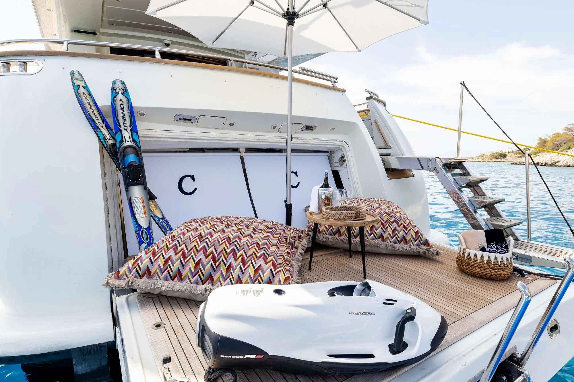 a boat with a basket on the deck aboard COOKIE Yacht for Charter
