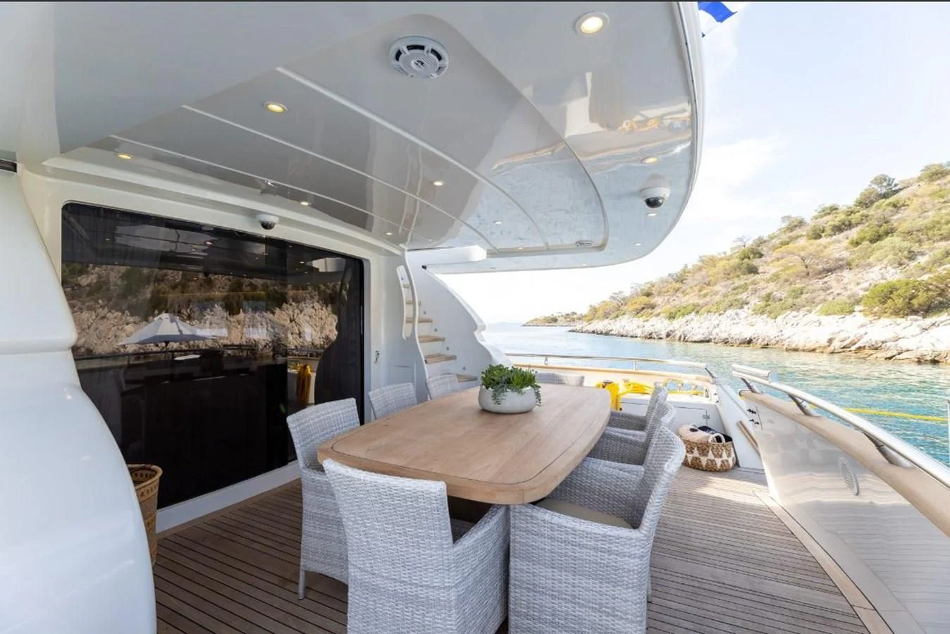 a table on a deck on a boat aboard COOKIE Yacht for Charter
