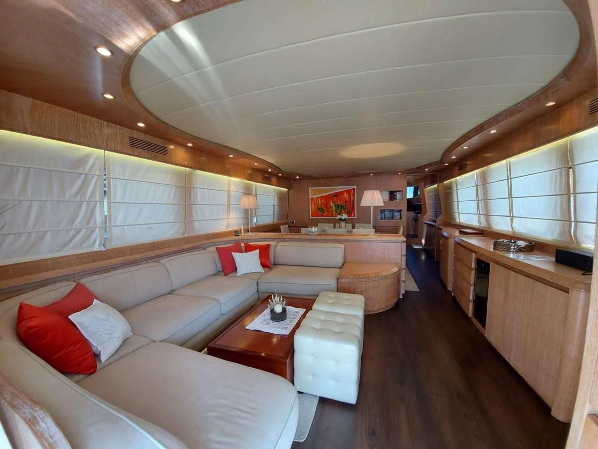 a large living room with a wood floor aboard COOKIE Yacht for Charter