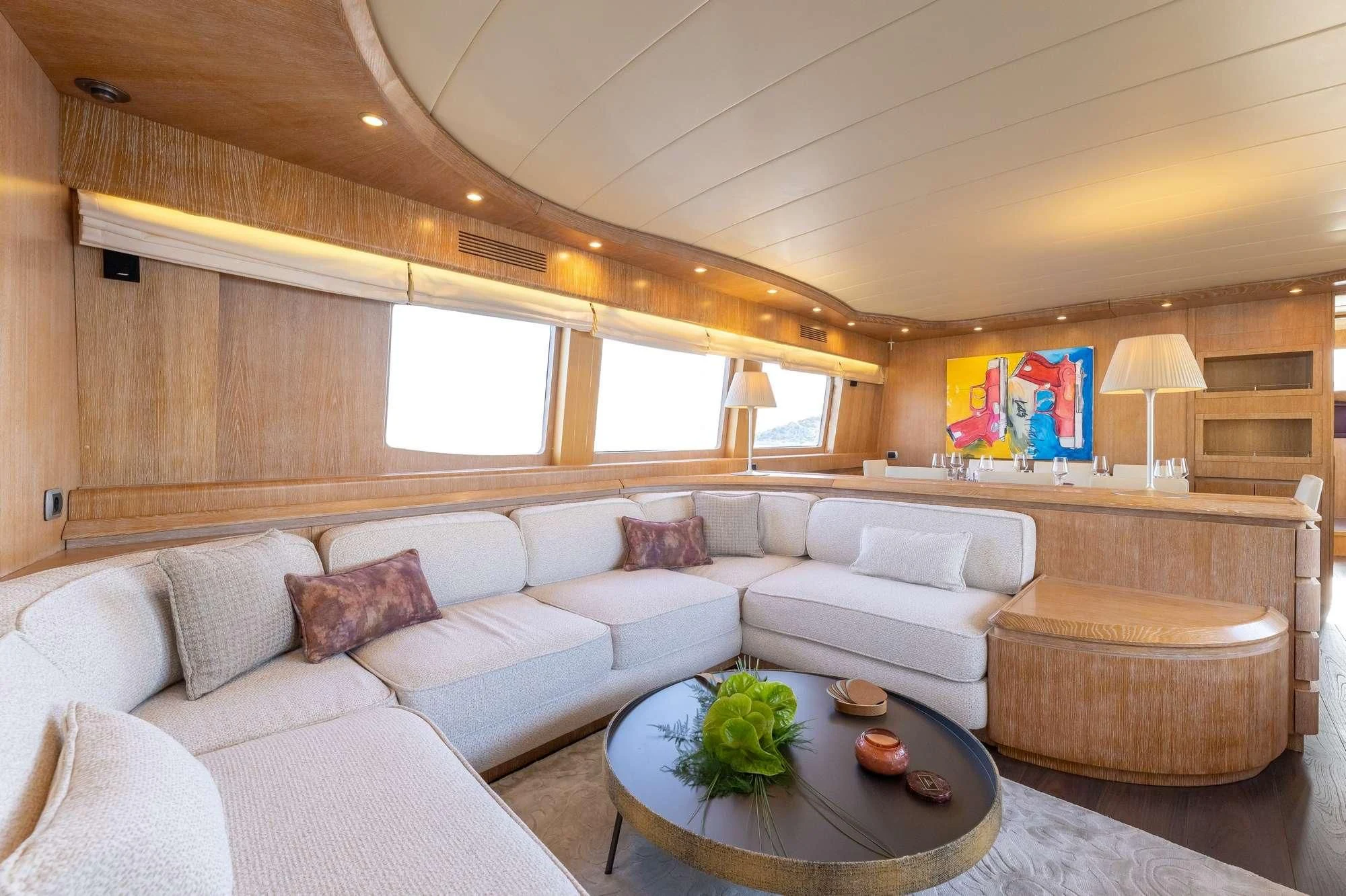 a living room with a couch and a table aboard COOKIE Yacht for Charter