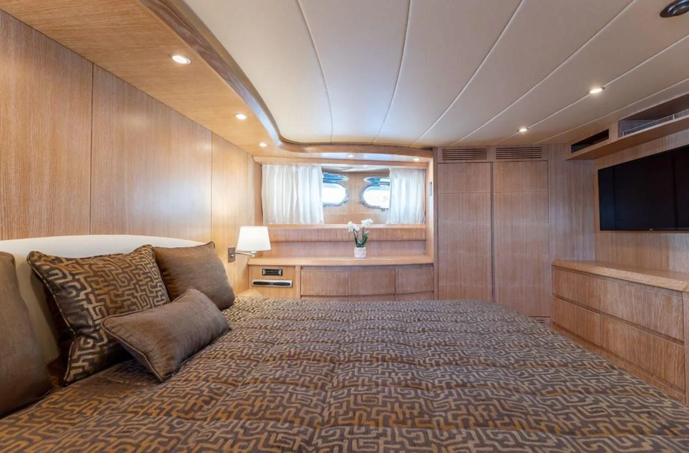 a large bed in a room aboard COOKIE Yacht for Charter