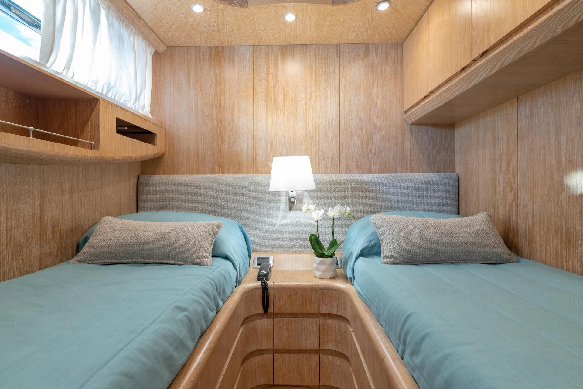 a room with two beds aboard COOKIE Yacht for Charter