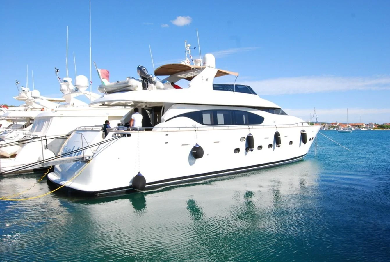 a white boat in the water aboard COOKIE Yacht for Charter