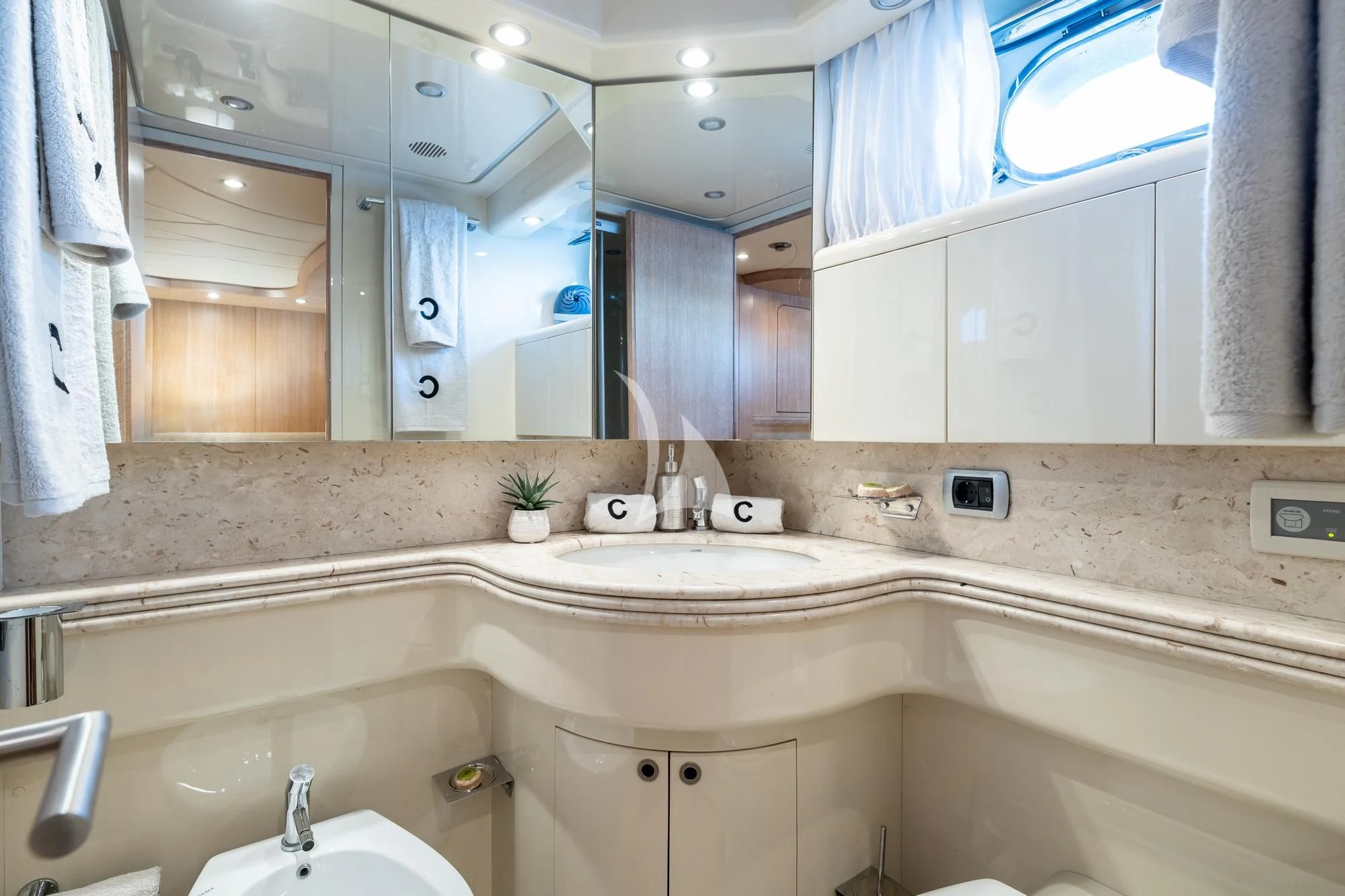 a bathroom with a large mirror aboard COOKIE Yacht for Charter