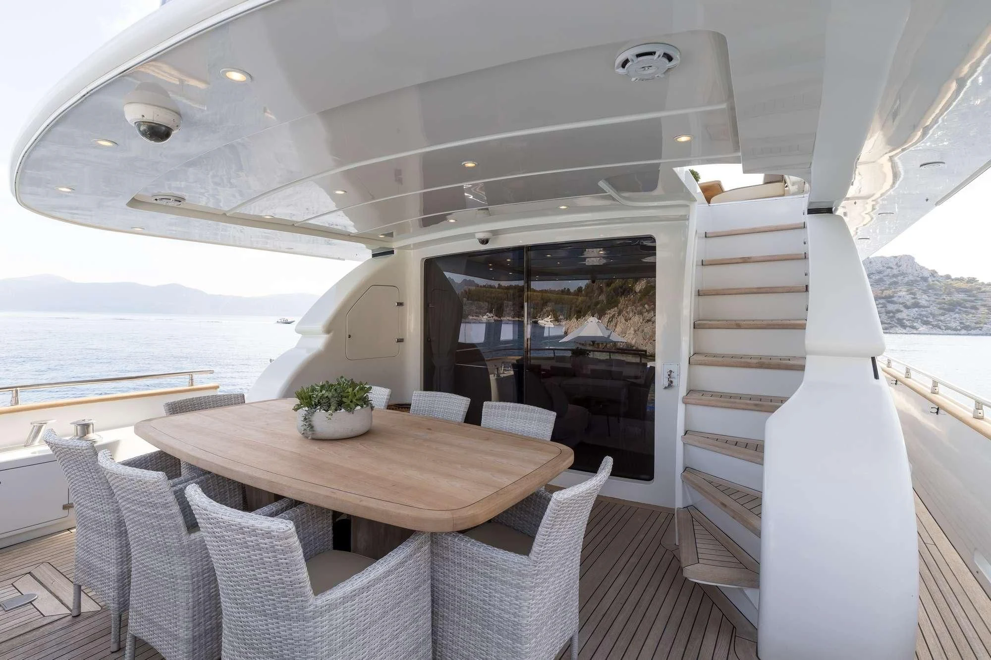 a table and chairs on a boat aboard COOKIE Yacht for Charter
