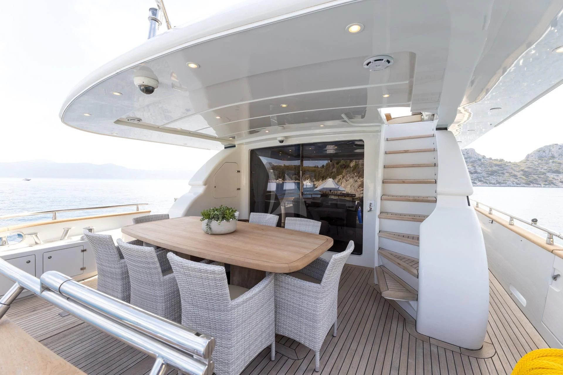 a table and chairs on a boat aboard COOKIE Yacht for Charter