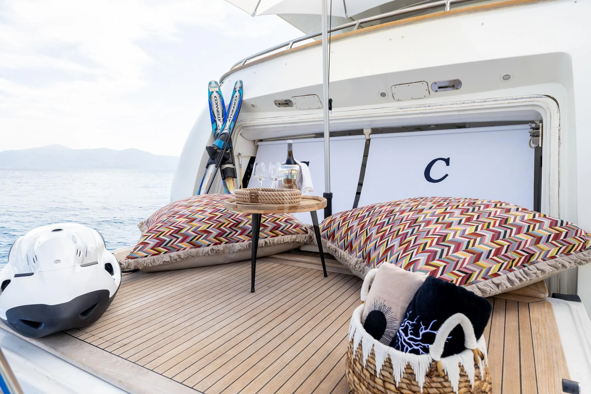 a couple of white eggs on a deck with a white boat in the background aboard COOKIE Yacht for Charter