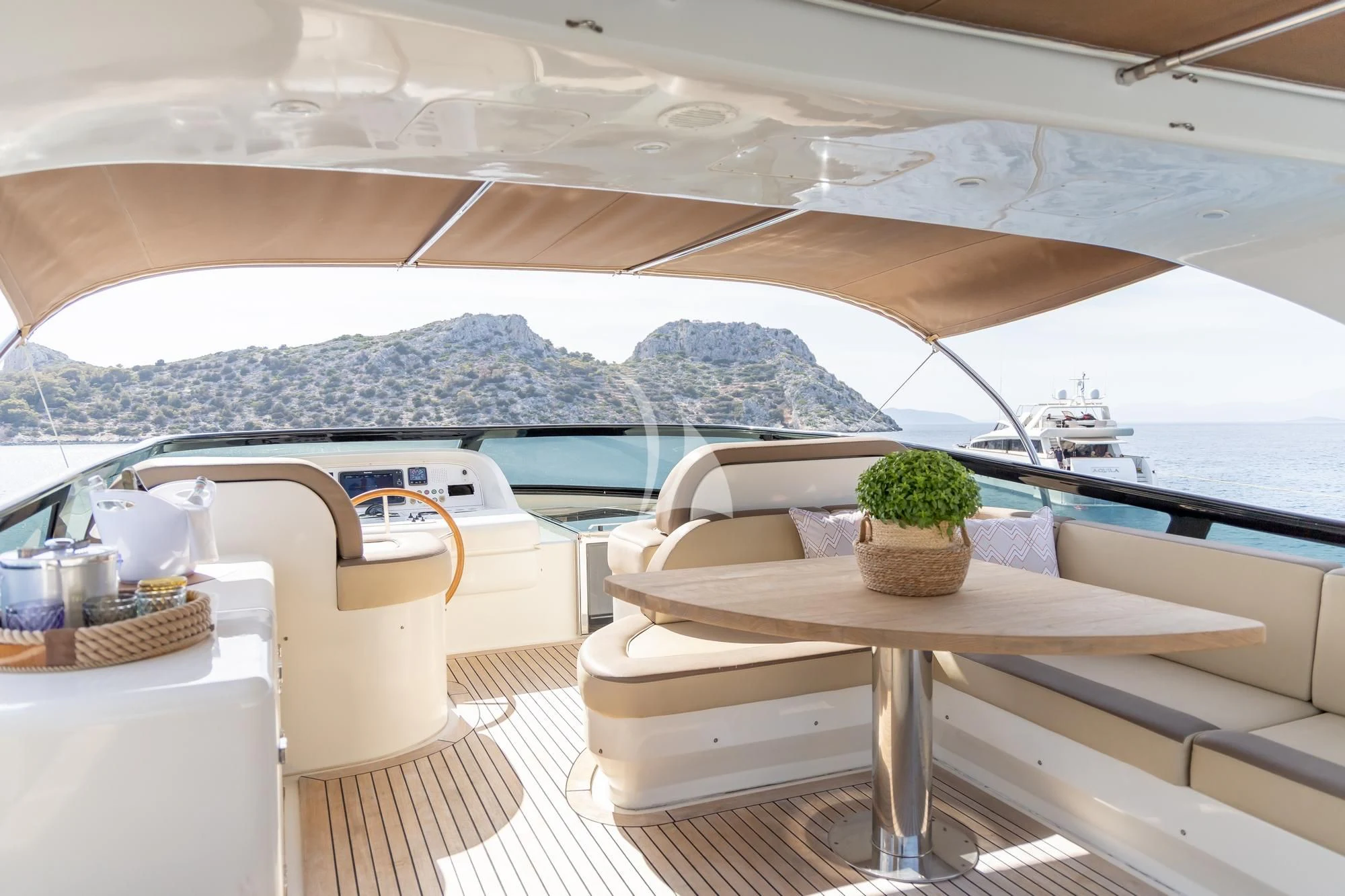 a table and chairs on a boat aboard COOKIE Yacht for Charter