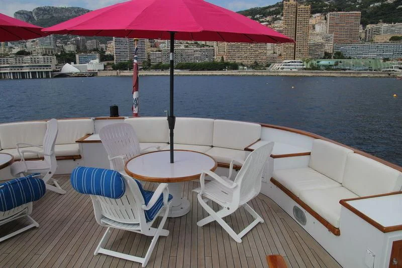 a table and chairs on a boat aboard SEAGULL OF CAYMAN Yacht for Sale