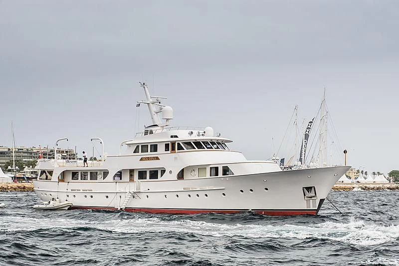 a large white boat in the water aboard SEAGULL OF CAYMAN Yacht for Sale