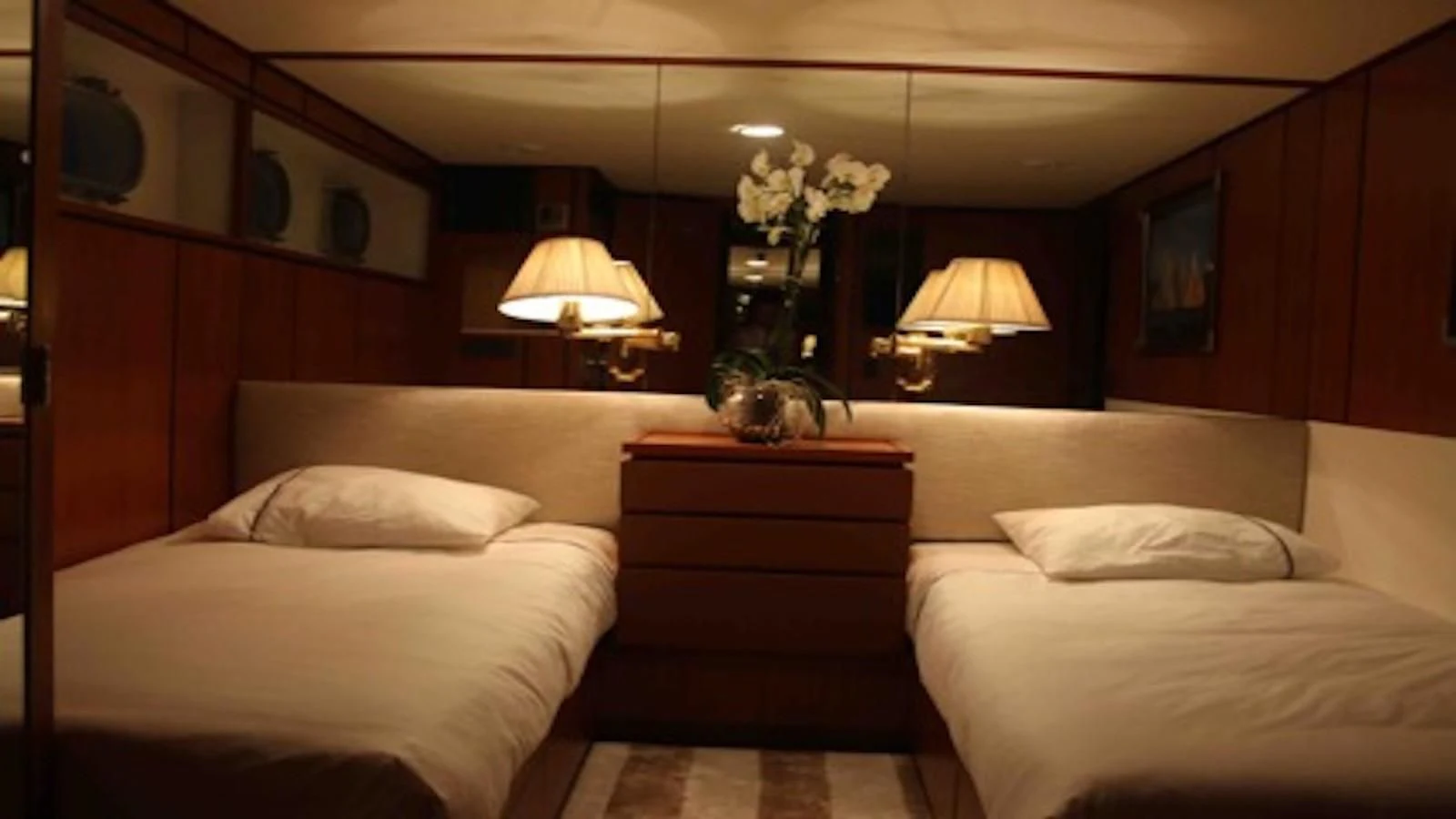 a hotel room with two beds aboard SEAGULL OF CAYMAN Yacht for Sale
