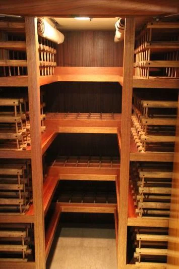 a wooden bunk bed in a room aboard SEAGULL OF CAYMAN Yacht for Sale