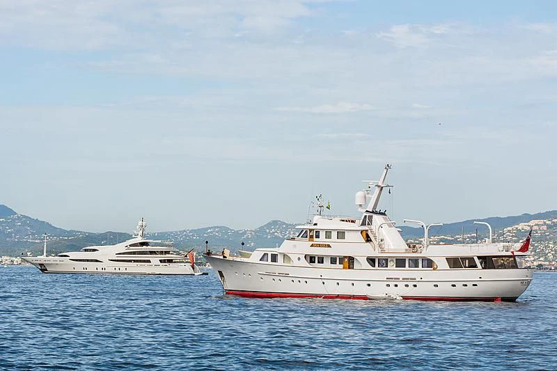 a couple of boats in the water aboard SEAGULL OF CAYMAN Yacht for Sale
