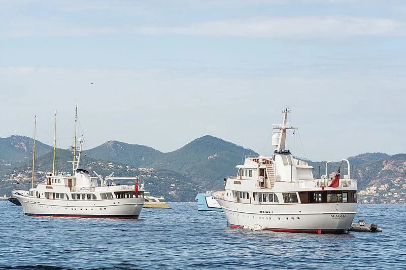a couple of boats in the water aboard SEAGULL OF CAYMAN Yacht for Sale