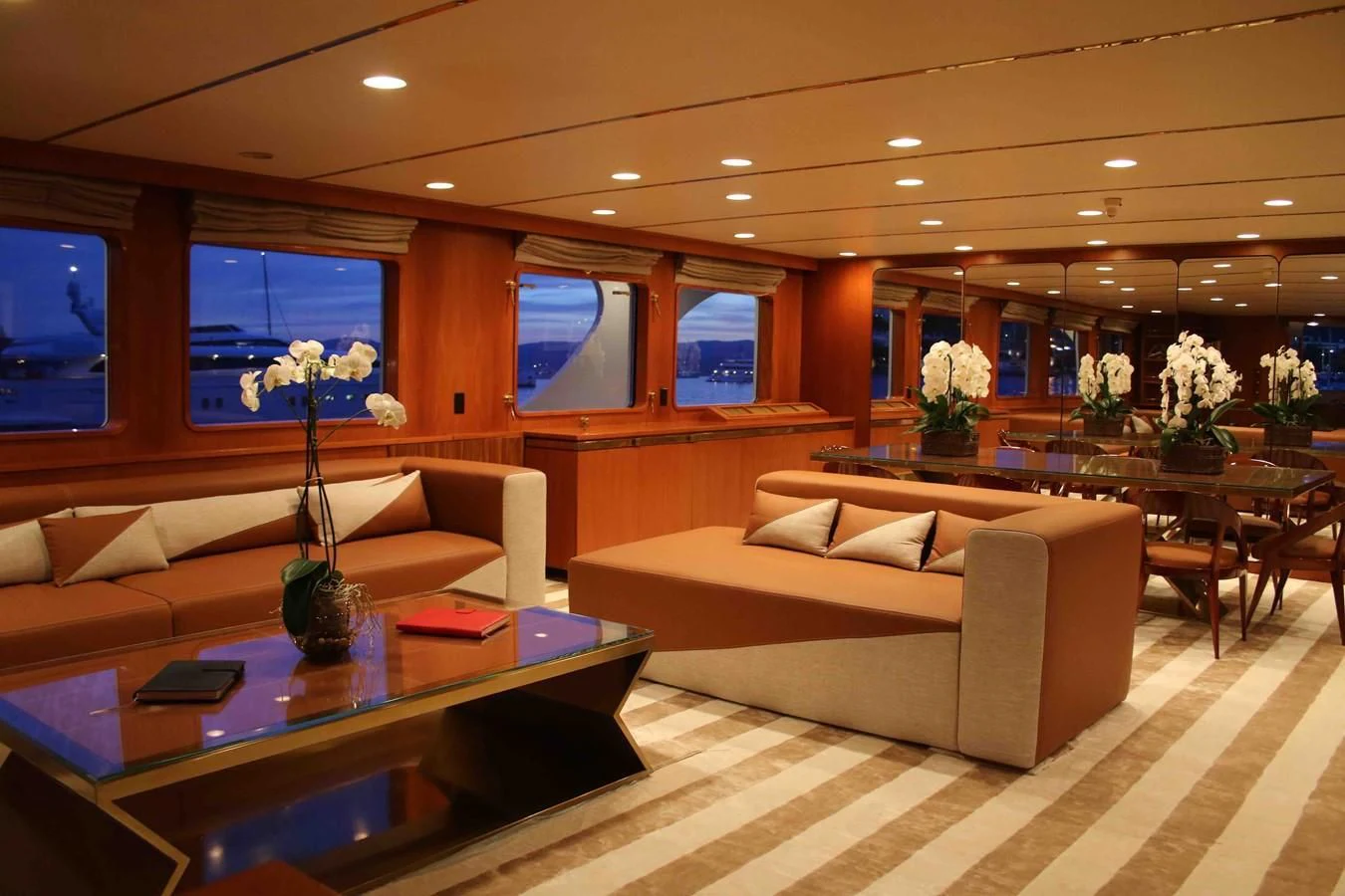 a living room with a couch and a table aboard SEAGULL OF CAYMAN Yacht for Sale