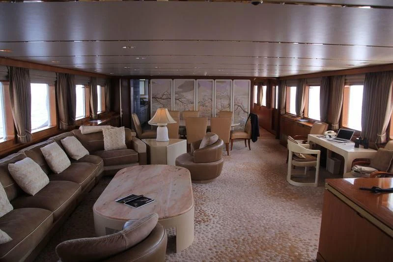 a living room with a couch and a table aboard SEAGULL OF CAYMAN Yacht for Sale