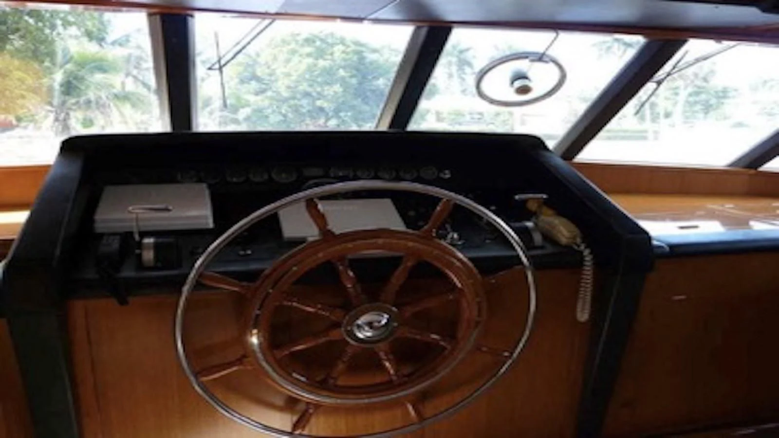 a steering wheel and dashboard of a car aboard SEAGULL OF CAYMAN Yacht for Sale