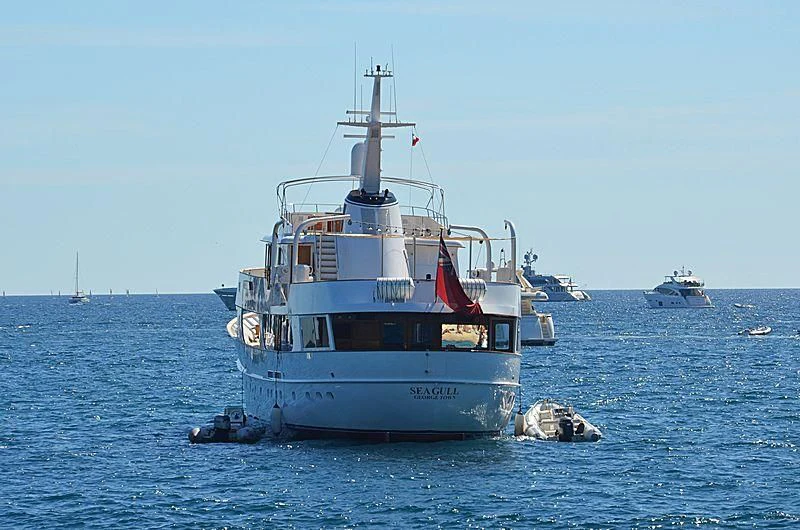 a large boat in the water aboard SEAGULL OF CAYMAN Yacht for Sale