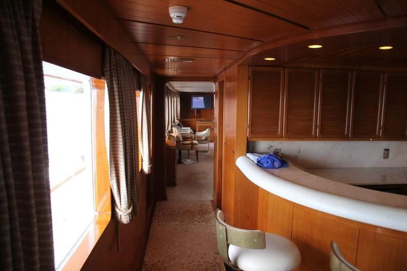a kitchen with a sink and cabinets aboard SEAGULL OF CAYMAN Yacht for Sale