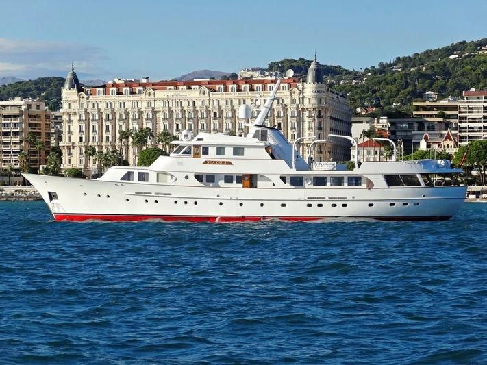 a large white boat in the water aboard SEAGULL OF CAYMAN Yacht for Sale