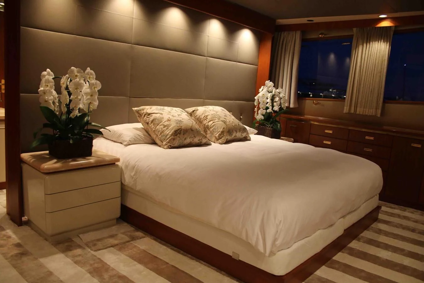 a bed with white sheets aboard SEAGULL OF CAYMAN Yacht for Sale