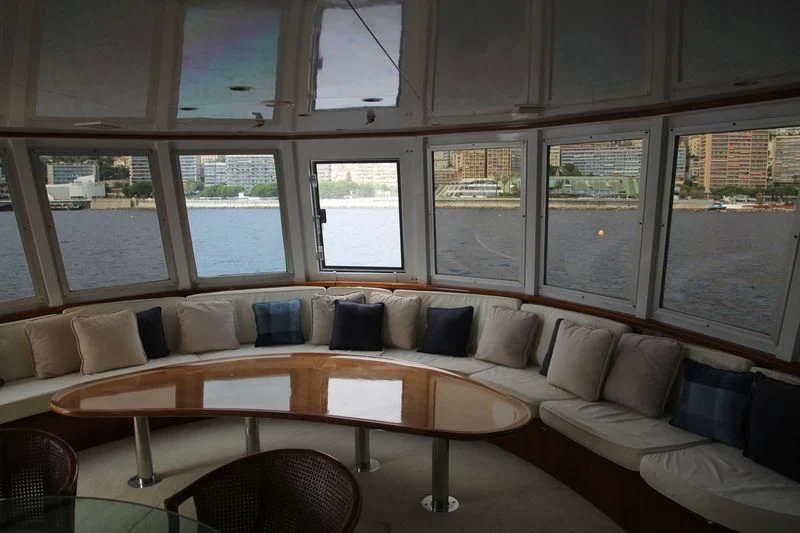 a living room with a couch and a table aboard SEAGULL OF CAYMAN Yacht for Sale