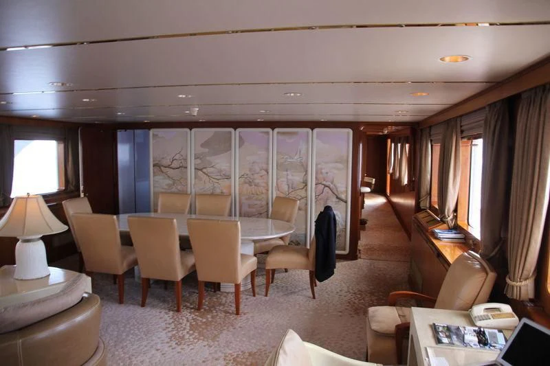 a room with chairs and tables aboard SEAGULL OF CAYMAN Yacht for Sale