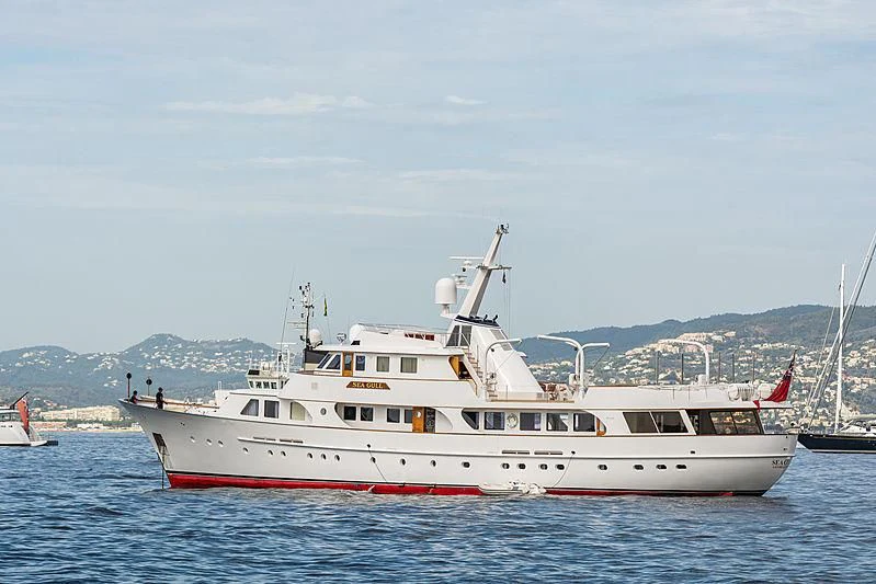 a large white boat in the water aboard SEAGULL OF CAYMAN Yacht for Sale