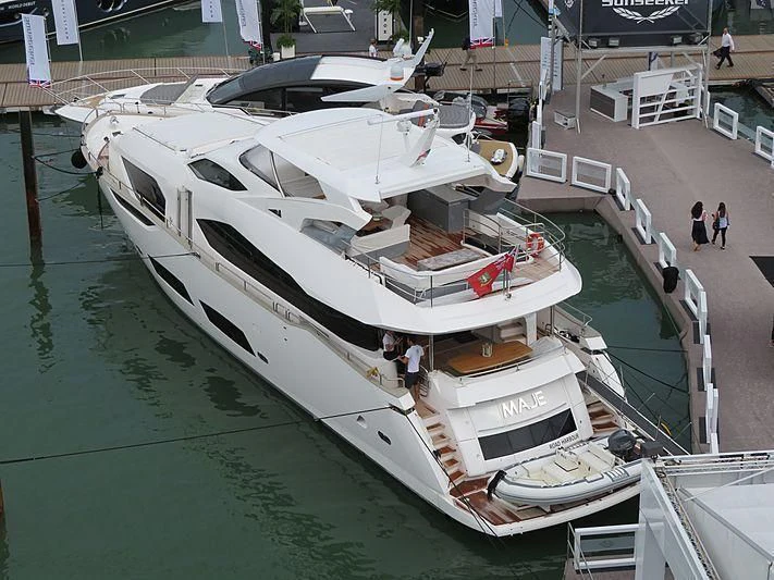 a boat docked at a pier aboard REUNION Yacht for Sale