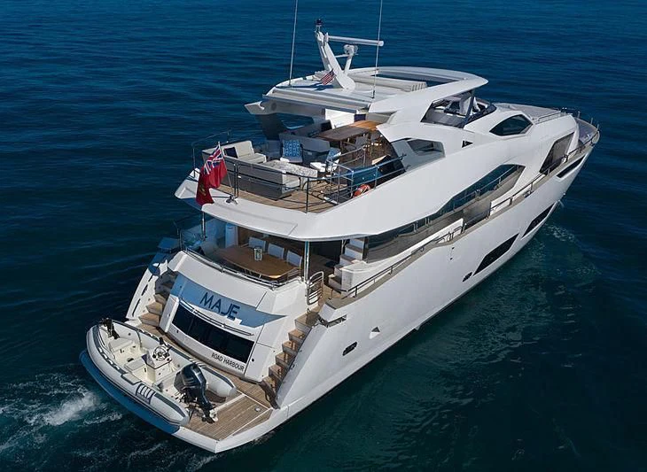 a large white boat in the water aboard REUNION Yacht for Sale