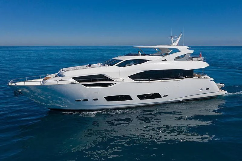 a white yacht in the water aboard REUNION Yacht for Sale