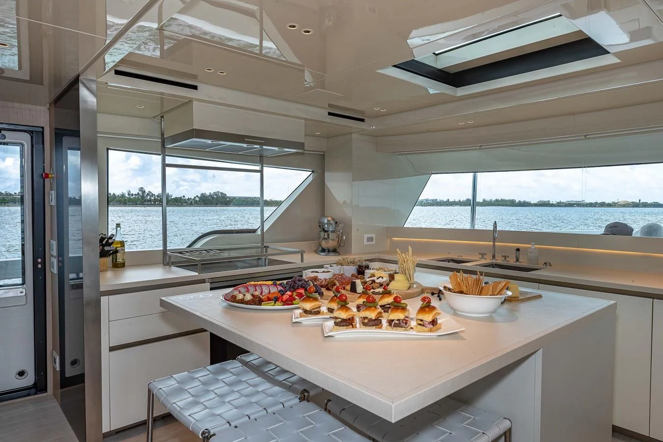 a kitchen with a large window aboard MAVE Yacht for Sale